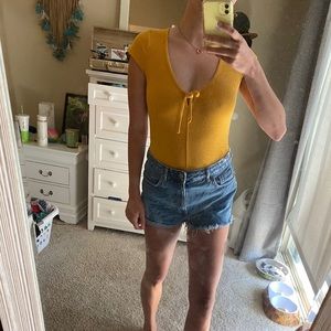 Yellow bodysuit